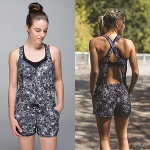 Lululemon The Runsie Flowabunga Floral Black Angle Romper Jumpsuit 6